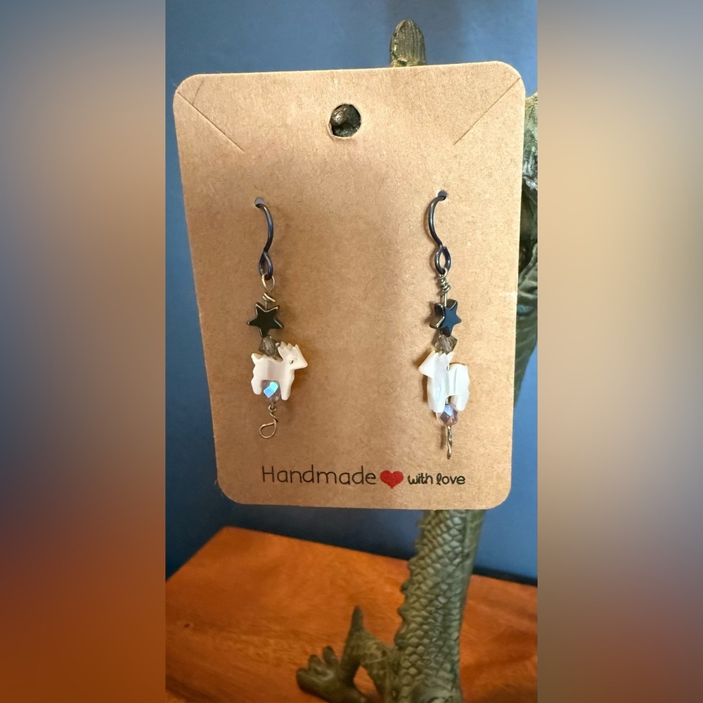 Handmade hematite star and mother of pearl reindeer Earrings